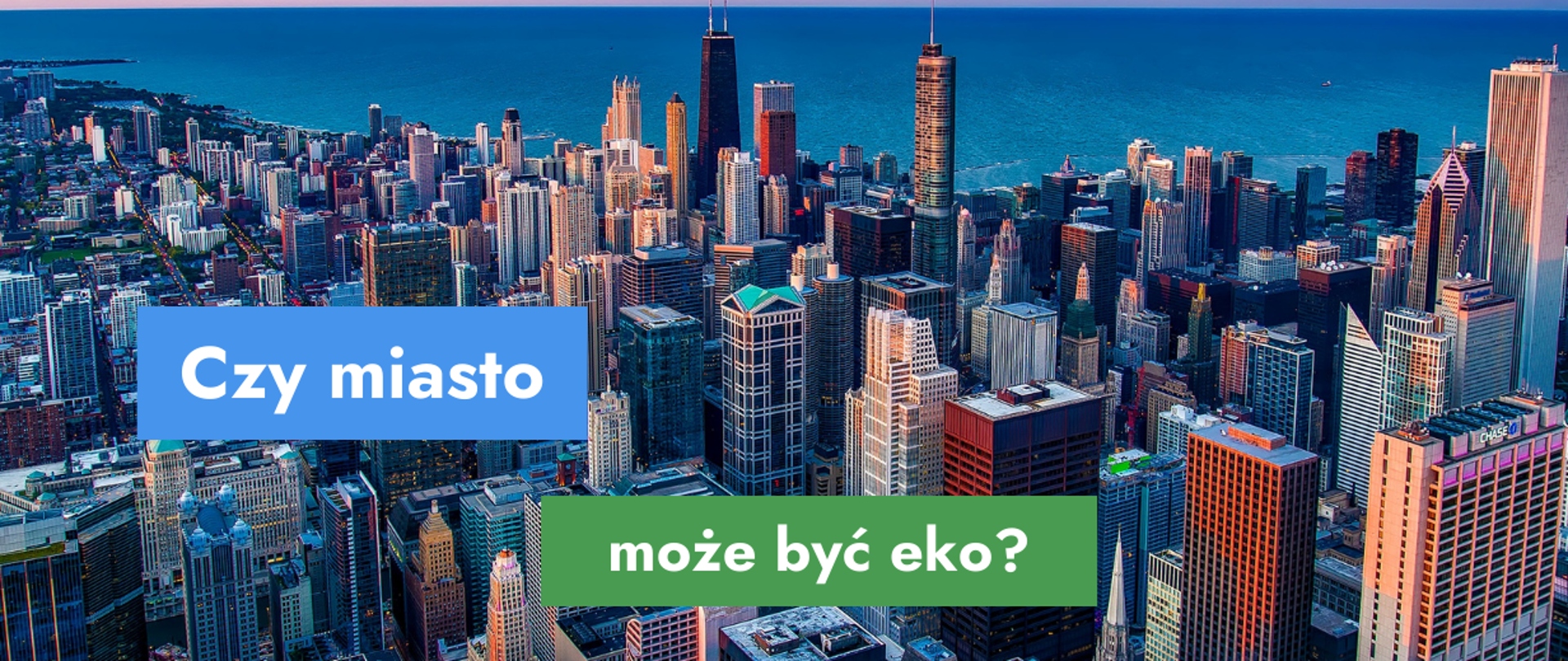 Na grafice zdjęcie drapaczy chmur w mieście oraz tekst: Czy miasto może być eko?