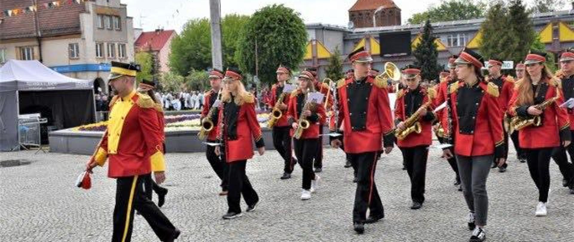 Zdjęcie w tle przedstawiające orkiestrę dentą