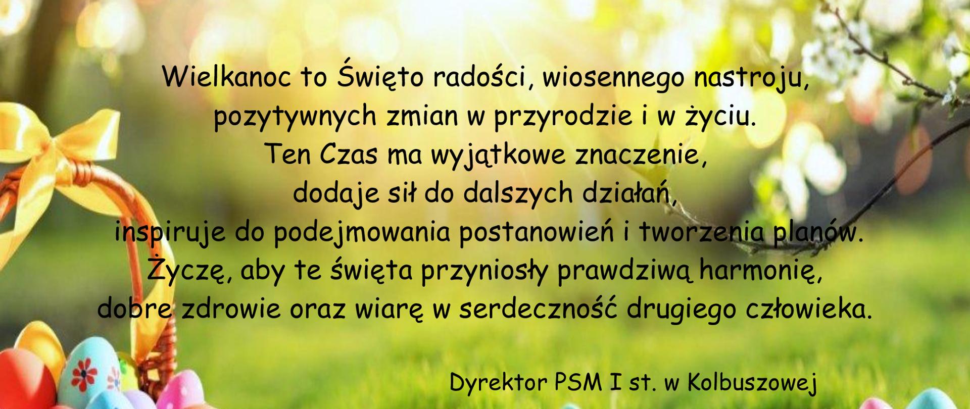 Plakat na zielonym tle. Na dole znajdują się kolorowe pisanki. Na środku plakatu jest tekst życzeń świątecznych