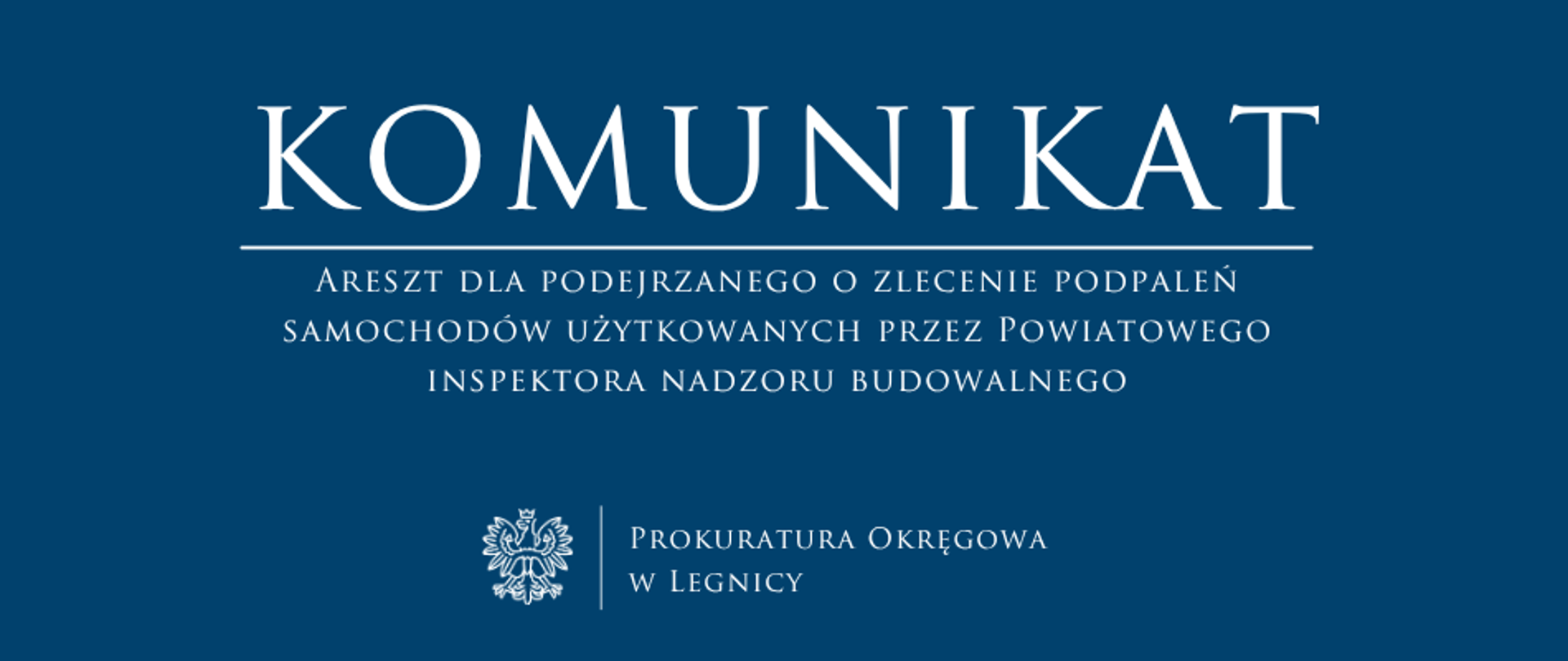 baner - na niebieskim tle napis w kolorze białym Komunikat, poniżej pozioma biała kreska, pod kreską tytuł, niżej pośrodku rysunek orła oddzielony od napisu Prokuratura Okręgowa w Legnicy krótką pionową kreską