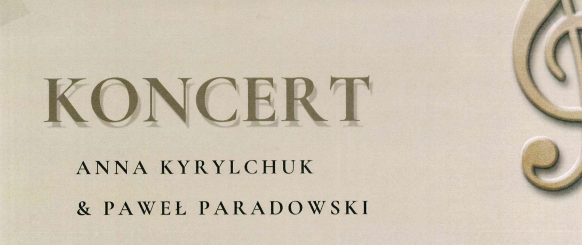 Plakat koncertu. Napisy na górze "Koncert Anna Kyrylchuk & Paweł Paradowski, w programie utwory Bacha, Beethovena, Chopina, Joplina. w kolorze brązowym oraz czarnym. Na dole data koncertu: piątek, 29 września godz. 17:00 w kolorze czarnym. Po środku widoczna ilustracja klawiatury fortepianu na kształt ślimaka, a nad nią pięciolinia z kluczem wiolinowym i nutami w kolorze pomarańczowo-białym. W górnym prawym i dolnym lewym rogu widoczne obcięte klucze wiolinowe.