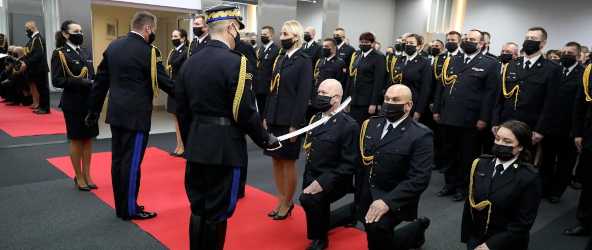 Na zdjęciu strażacy podczas uroczystości w Komedzie głównej PSP