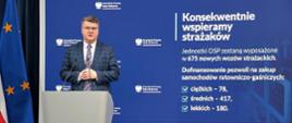 Wiceminister MSWiA Maciej Wąsik w trakcie ogłaszania programu wsparcia na zakup samochodów dla OSP
