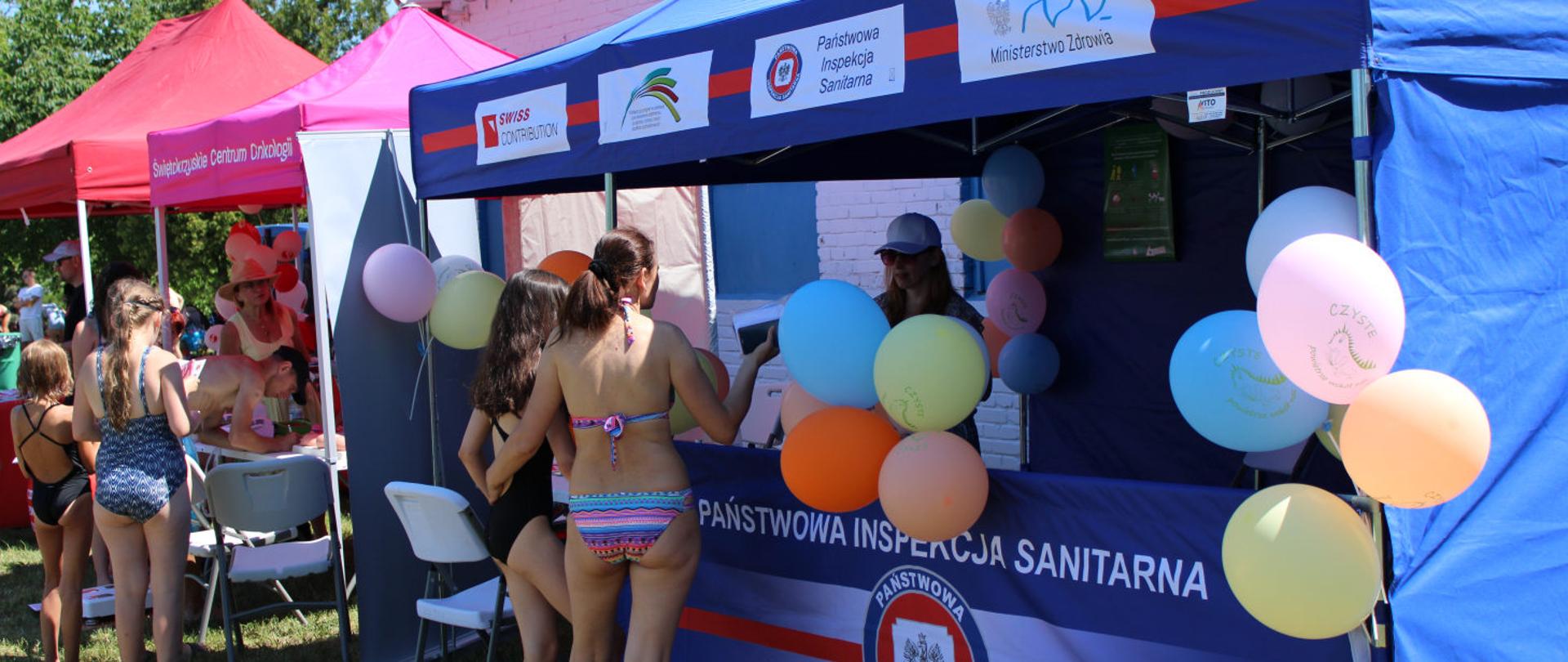 Stoisko informacyjno-edukacyjne podczas Festynu Rodzinnego: „Bezpieczne Wakacje”