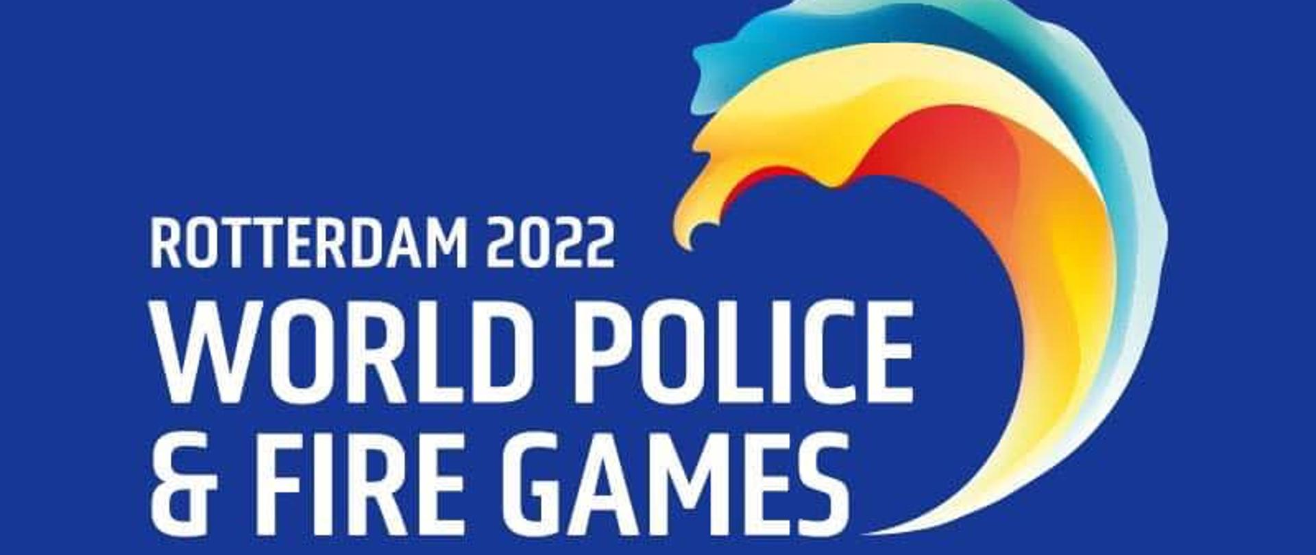 Na niebieskim tle logotyp Światowych Igrzysk Strażaków i Policjantów Rotterdam 2022 
