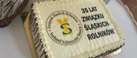 Tort z napisem "35 lat Związku Śląskich Rolników" i logo związku.