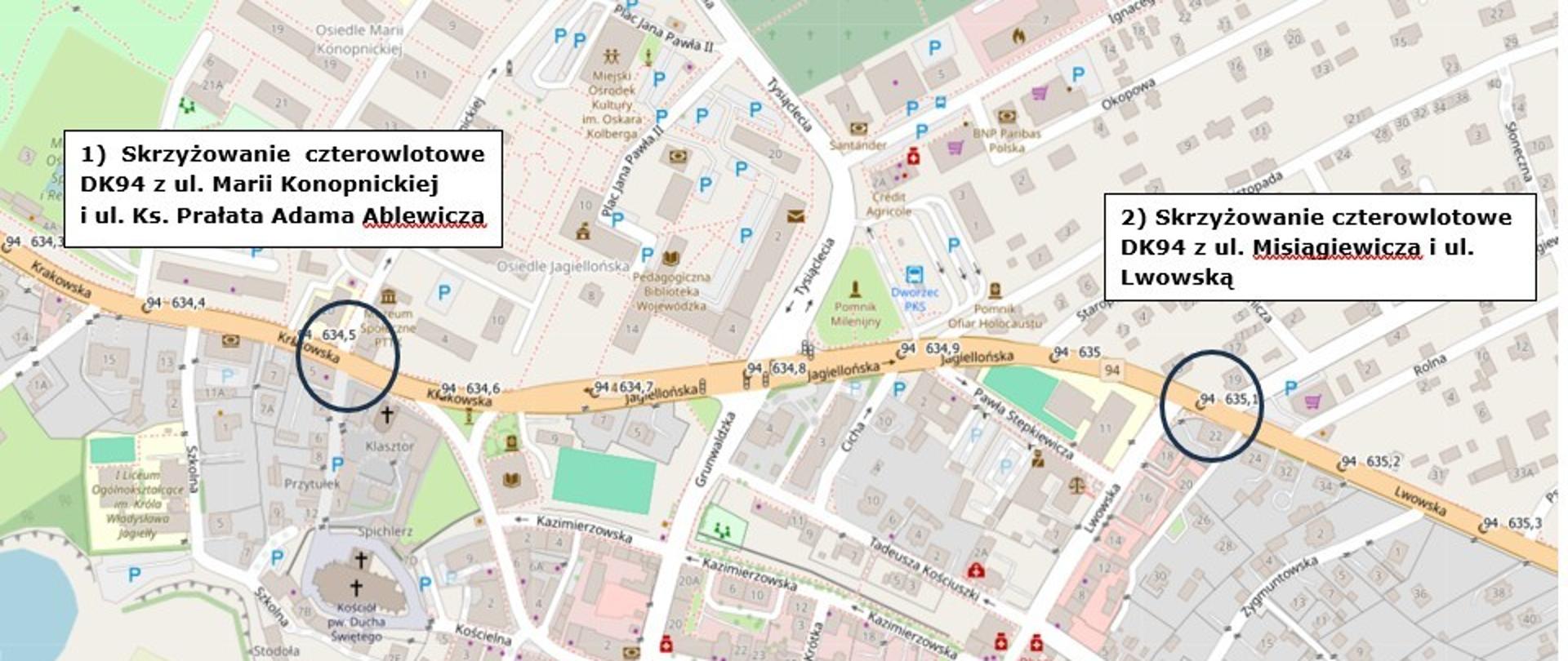 Mapa fragmentu miasta Przeworsk przedstawiająca odcinek drogi krajowej DK94. Na mapie zaznaczono dwa skrzyżowania czterowlotowe: pierwsze z ulicami Marii Konopnickiej i księdza Prałata Adama Ablewicza oraz drugie z ulicami Adama Mickiewicza i Lwowską. Skrzyżowania zostały oznaczone okręgami i opisane numerami. Widoczna zabudowa miejska, sieć ulic oraz oznaczenia punktów parkingowych.