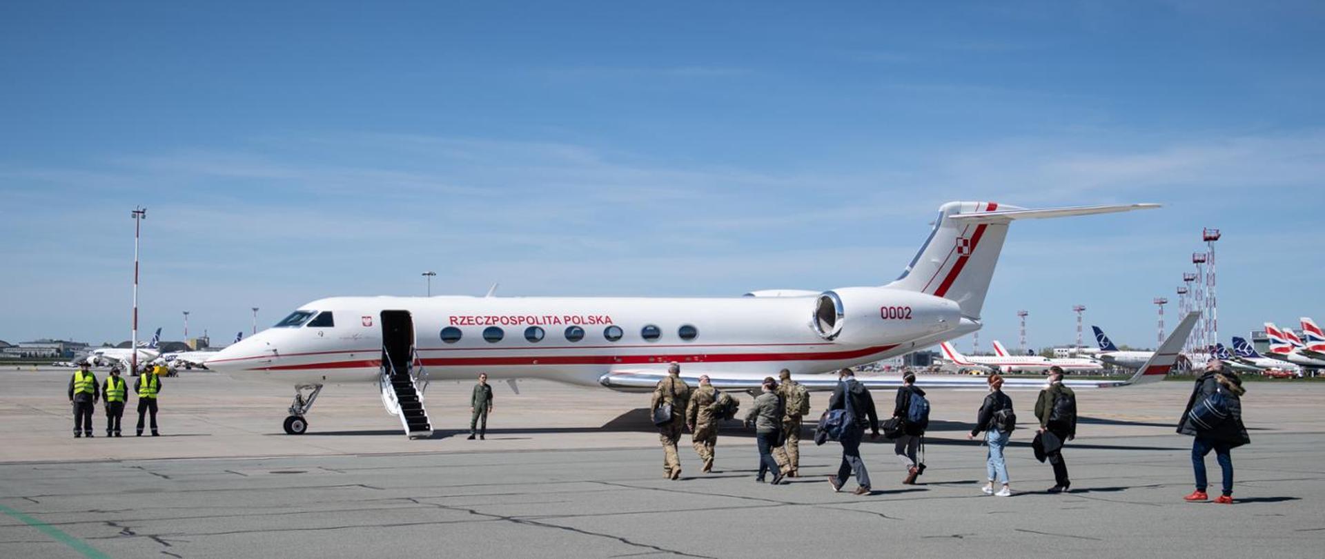Humanitarian team boarding a plane