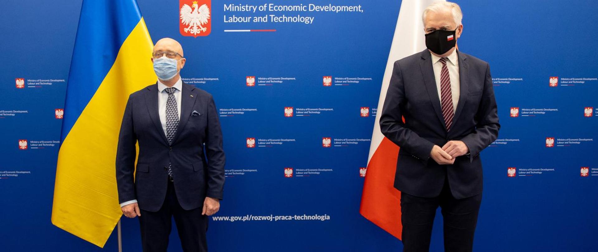 Prime Minister Jarosław Gowin and Oleksij Reznikov, Deputy Prime Minister of Ukraine, by the countries flags