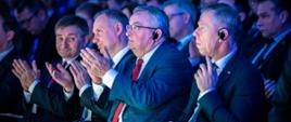 Minister infrastruktury Andrzej Adamczyk wraz Prezydentem RP Andrzejem Dudą i ministrem w KPRM Markiem Kuchcińskim