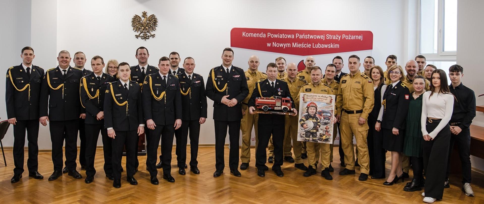 Uroczysta zbiórka z okazji przejścia na zaopatrzenie emerytalne st. ogn. Marcina Wiśniewskiego