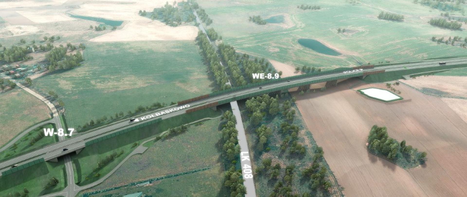 Widok z lotu ptaka na wizualizację drogi ekspresowej przebiegającej przez tereny rolnicze i zadrzewione. Na obrazie widać kilka wiaduktów oznaczonych jako W‑8.7 oraz WE‑8.9, a także przebieg linii kolejowej LK 408 pod jednym z obiektów. Droga biegnie po estakadzie nad polami, łąkami i niewielkimi zbiornikami wodnymi. Wokół rozciągają się otwarte tereny wiejskie z rozproszonymi skupiskami drzew.