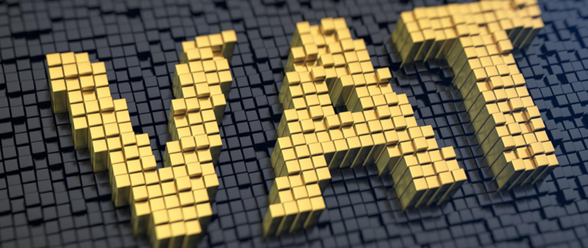 Napis VAT na szarym tle